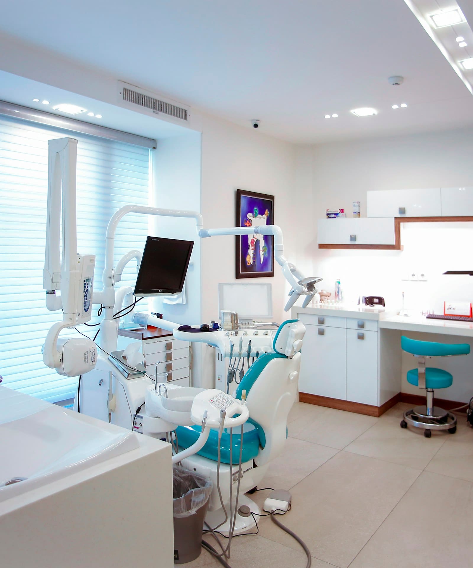 The treatment room at OK Dental Care Muzaffarpur, with a dental chair and equipment